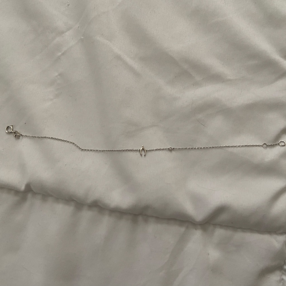 Sterling silver wishbone bracelet with tiny diamond